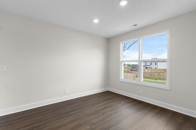 235 Donegal Dr, Clarksville, TN 37042 - empty room with recessed lighting, dark wood finished floors, visible vents, and baseboards