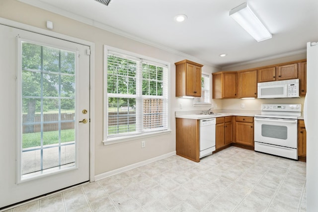 502 Village Green Cir, Murfreesboro, TN 37128 - kitchen with white appliances, crown molding, light countertops, baseboards, and a sink