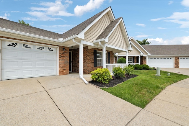502 Village Green Cir, Murfreesboro, TN 37128 - view of front of house featuring driveway, an attached garage, brick siding, a porch, and a front lawn