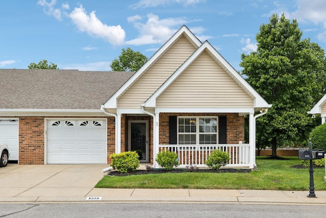 502 Village Green Cir, Murfreesboro, TN 37128 - view of front of home with a porch, driveway, an attached garage, brick siding, and a front lawn