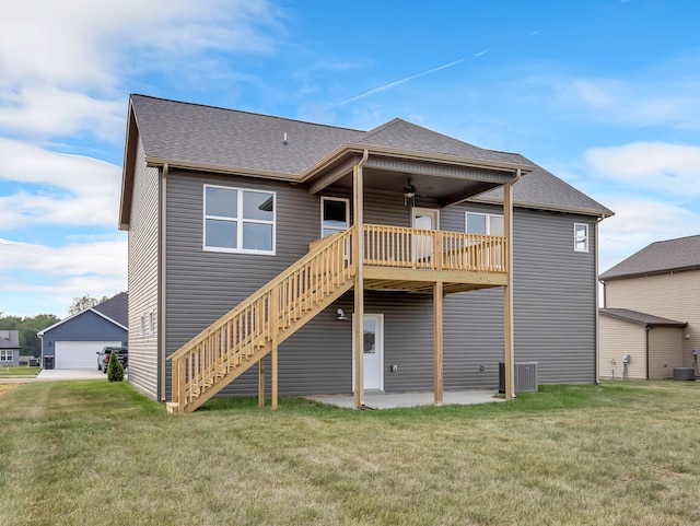 211 Donegal Dr, Clarksville, TN 37042 - back of property with a ceiling fan, a yard, central air condition unit, and stairway