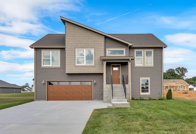 211 Donegal Dr, Clarksville, TN 37042 - view of front of home with a front yard, driveway, and an attached garage