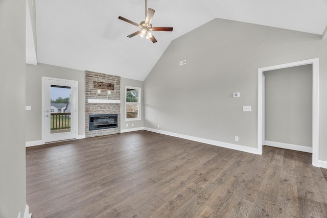 211 Donegal Dr, Clarksville, TN 37042 - unfurnished living room featuring ceiling fan, high vaulted ceiling, a large fireplace, dark wood-style floors, and baseboards