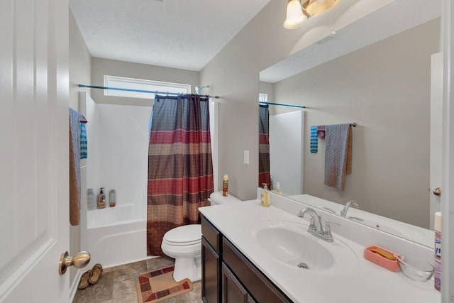 bathroom featuring vanity, toilet, and shower / tub combo