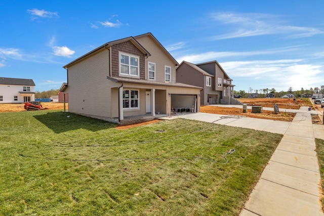 215 Donegal Dr, Clarksville, TN 37042 - back of property featuring concrete driveway and a yard