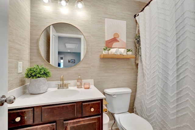 bathroom featuring tile walls, a shower with shower curtain, toilet, and vanity