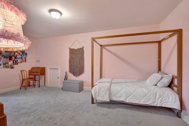 carpeted bedroom with baseboards