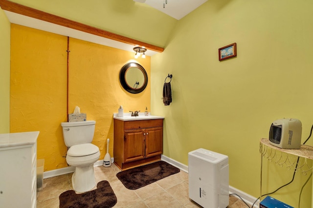 100 Treeann Ln, Ringgold, GA 30736 - bathroom with vanity, toilet, a ceiling fan, and baseboards