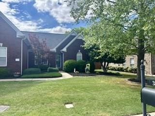 exterior space with a front lawn