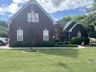 view of property exterior with a lawn