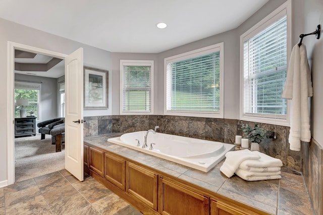 1199 Ben Hill Blvd, Nolensville, TN 37135 - bathroom featuring a garden tub and stone finish flooring
