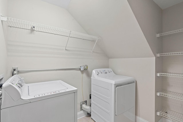 3201 Aspen Grove Dr Unit L8, Franklin, TN 37067 - washroom with baseboards, laundry area, and independent washer and dryer