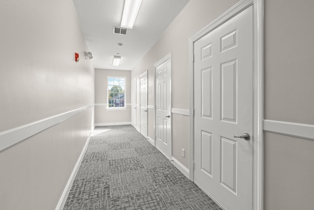 3201 Aspen Grove Dr Unit L8, Franklin, TN 37067 - corridor with baseboards, visible vents, and dark carpet