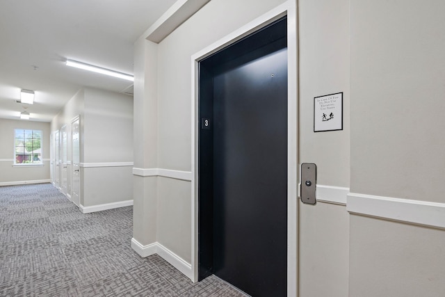 3201 Aspen Grove Dr Unit L8, Franklin, TN 37067 - hall with carpet floors, baseboards, and elevator