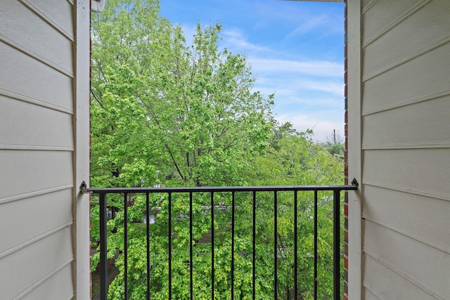 3201 Aspen Grove Dr Unit L8, Franklin, TN 37067 - balcony featuring a wooded view