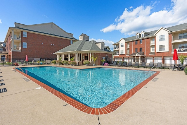 3201 Aspen Grove Dr Unit L8, Franklin, TN 37067 - community pool featuring a patio area, fence, and a residential view