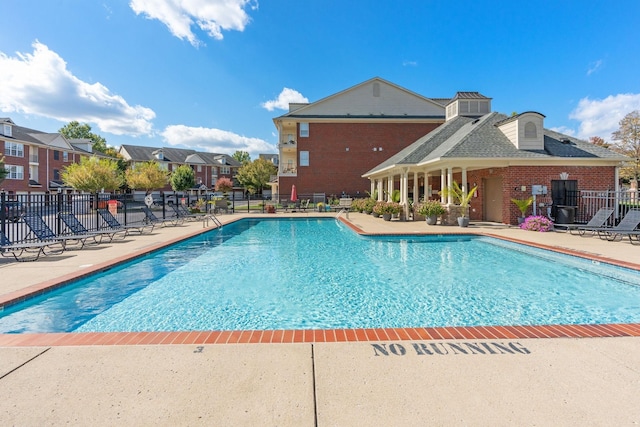 3201 Aspen Grove Dr Unit L8, Franklin, TN 37067 - community pool with fence, a patio area, and a residential view