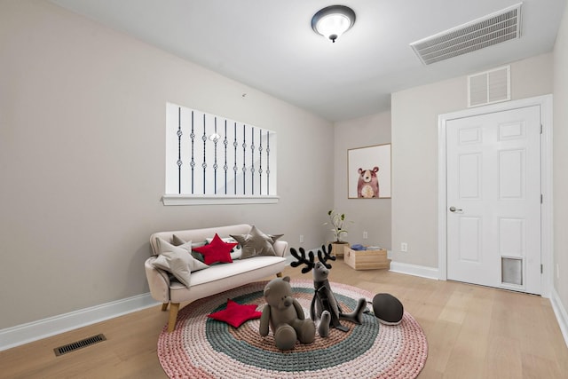 3201 Aspen Grove Dr Unit L8, Franklin, TN 37067 - sitting room featuring wood finished floors and visible vents