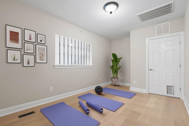 3201 Aspen Grove Dr Unit L8, Franklin, TN 37067 - workout room with visible vents, baseboards, and wood finished floors