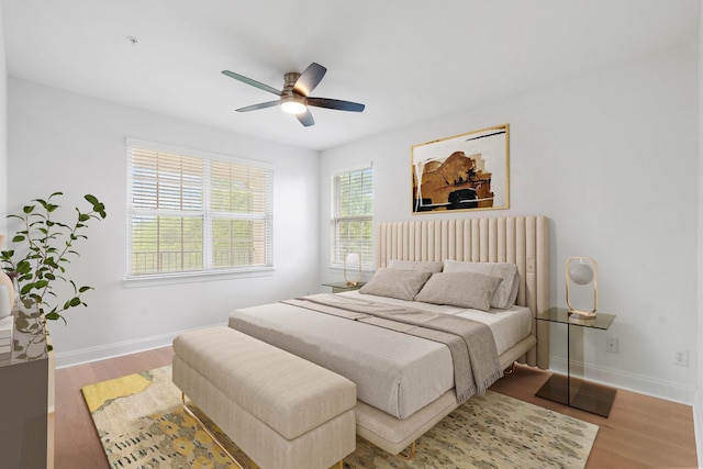 3201 Aspen Grove Dr Unit L8, Franklin, TN 37067 - bedroom featuring baseboards, a ceiling fan, and wood finished floors