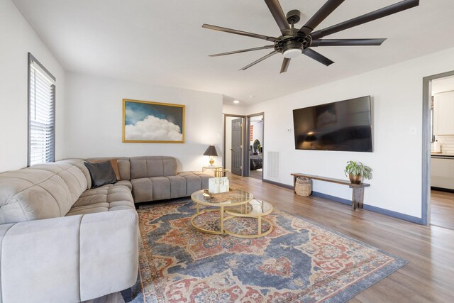 1883 Sawgrass Ln, Chapel Hill, TN 37034 - living room featuring a ceiling fan, visible vents, wood finished floors, and baseboards