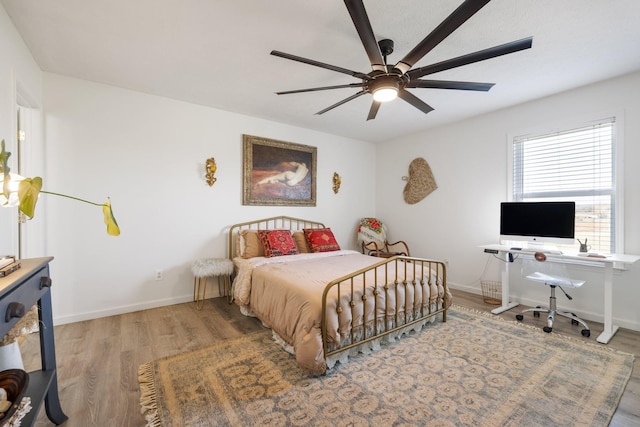 1883 Sawgrass Ln, Chapel Hill, TN 37034 - bedroom with ceiling fan, wood finished floors, and baseboards