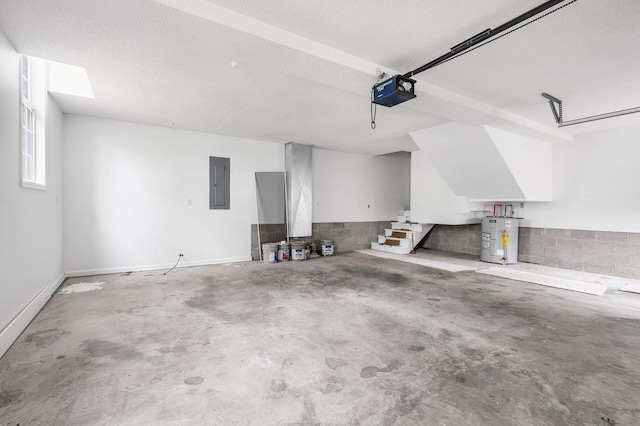 garage featuring a garage door opener, electric panel, and electric water heater