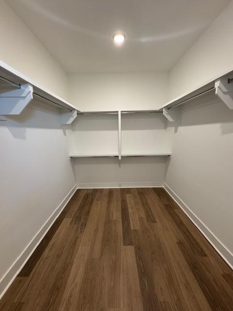 5738 Lennis Ln, Murfreesboro, TN 37129 - spacious closet featuring dark wood-type flooring