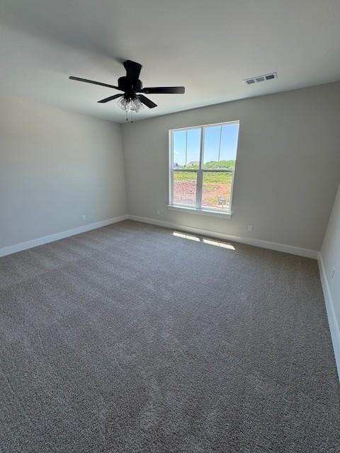 5738 Lennis Ln, Murfreesboro, TN 37129 - carpeted spare room featuring baseboards and ceiling fan