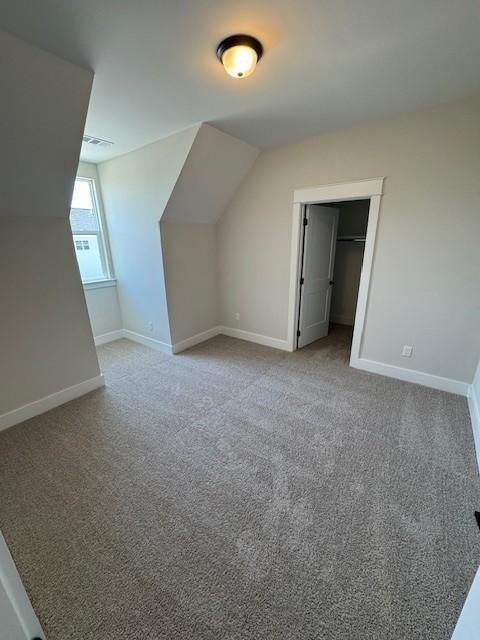 5738 Lennis Ln, Murfreesboro, TN 37129 - additional living space featuring carpet and vaulted ceiling