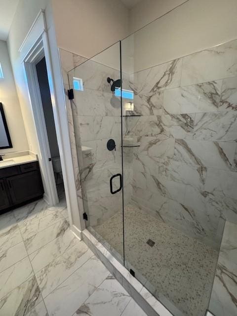 5738 Lennis Ln, Murfreesboro, TN 37129 - full bathroom featuring a marble finish shower, marble look tile flooring, and vanity