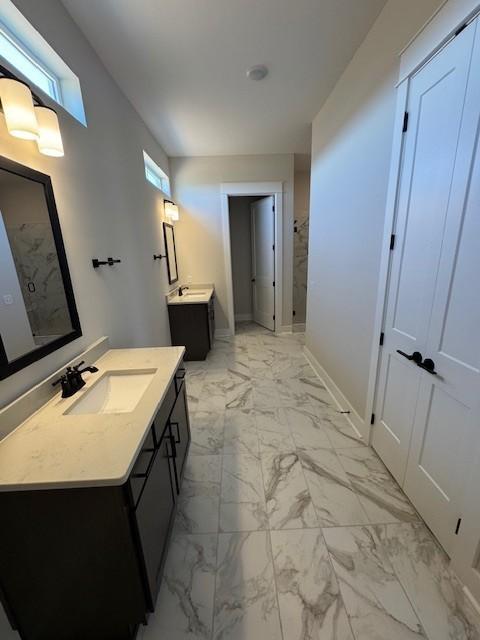 5738 Lennis Ln, Murfreesboro, TN 37129 - bathroom with marble finish flooring, two vanities, and a shower