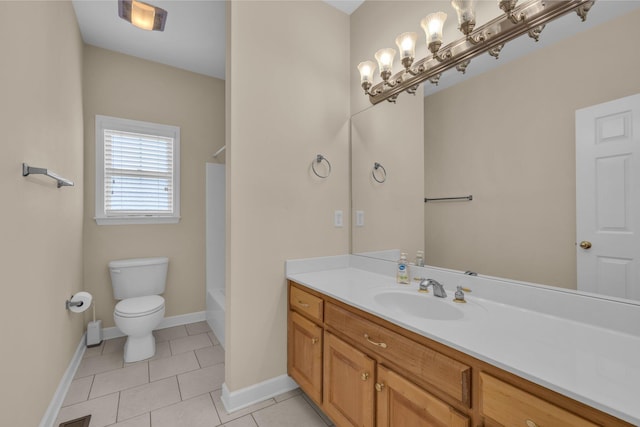 full bathroom featuring vanity, tile patterned floors, toilet, baseboards, and shower / washtub combination