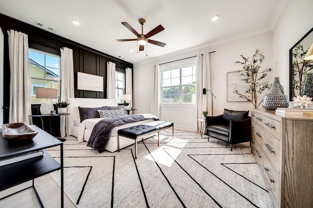 bedroom with crown molding, recessed lighting, ceiling fan, and visible vents