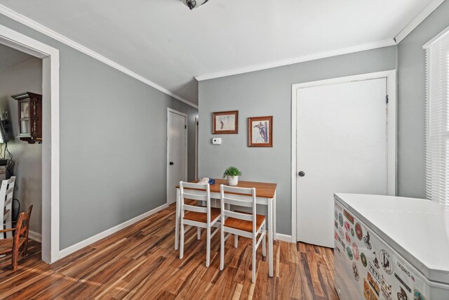 102 Lakeside Dr, Columbia, TN 38401 - dining area featuring baseboards, ornamental molding, and wood finished floors