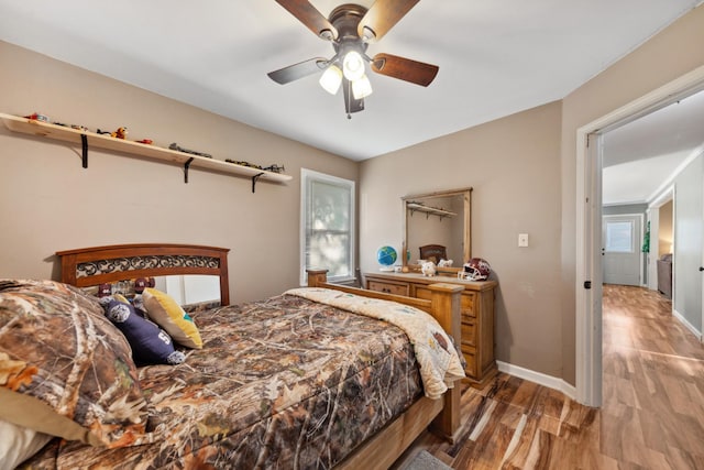 102 Lakeside Dr, Columbia, TN 38401 - bedroom with baseboards, ceiling fan, and wood finished floors
