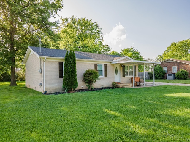 102 Lakeside Dr, Columbia, TN 38401 - view of front facade with brick siding, a front yard, and roof with shingles