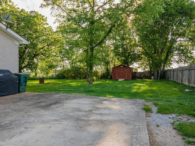 102 Lakeside Dr, Columbia, TN 38401 - view of yard with an outbuilding, a shed, and a fenced backyard