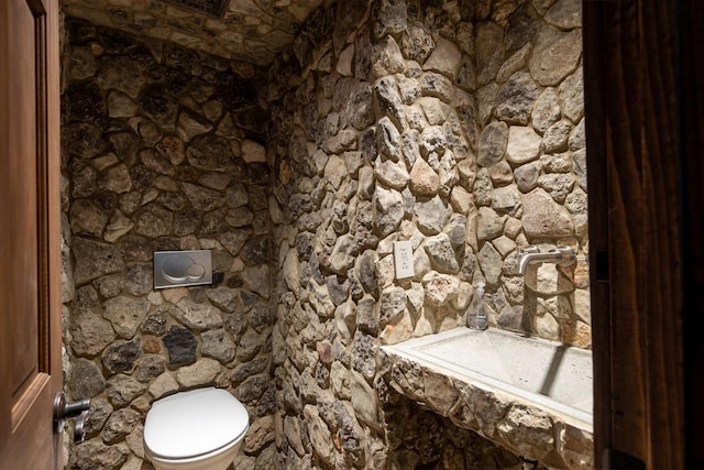 bathroom featuring toilet
