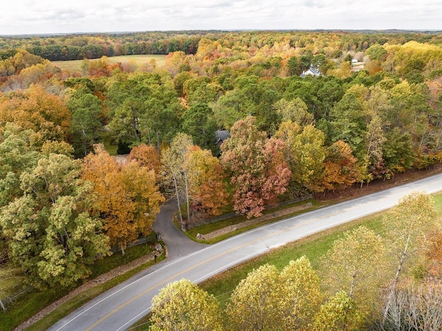 bird's eye view featuring a view of trees