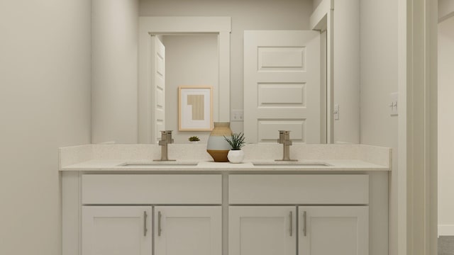 full bathroom with double vanity and a sink