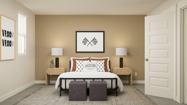 carpeted bedroom featuring baseboards