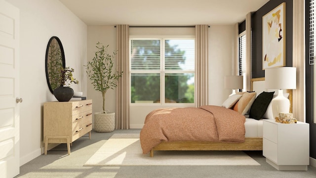 bedroom with baseboards and carpet floors