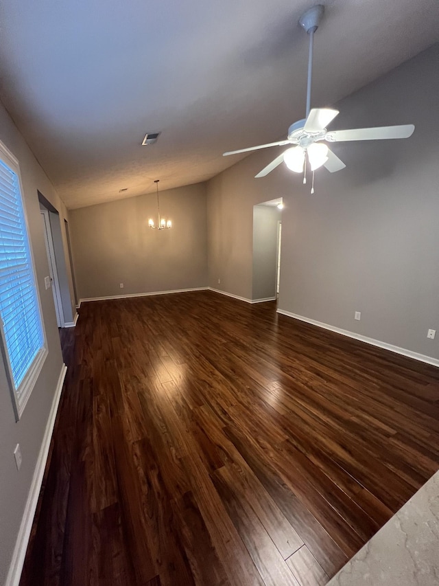 800 Browns Ln Unit L2, Gallatin, TN 37066 - spare room with lofted ceiling, baseboards, ceiling fan with notable chandelier, and dark wood-type flooring