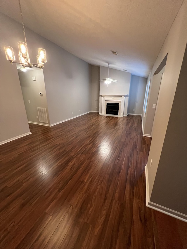 800 Browns Ln Unit L2, Gallatin, TN 37066 - unfurnished living room with lofted ceiling, dark wood-type flooring, and visible vents