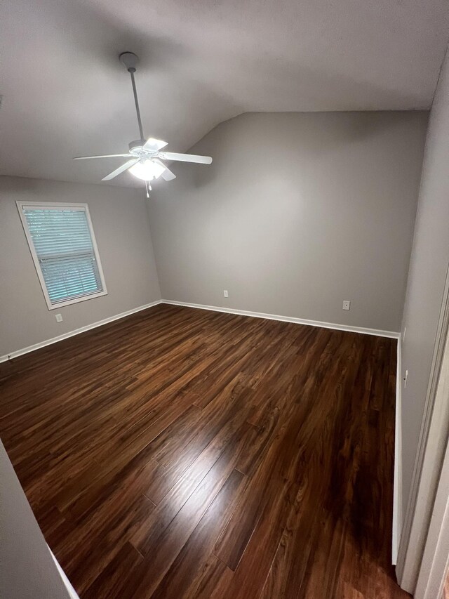 800 Browns Ln Unit L2, Gallatin, TN 37066 - empty room with vaulted ceiling, baseboards, a ceiling fan, and dark wood finished floors