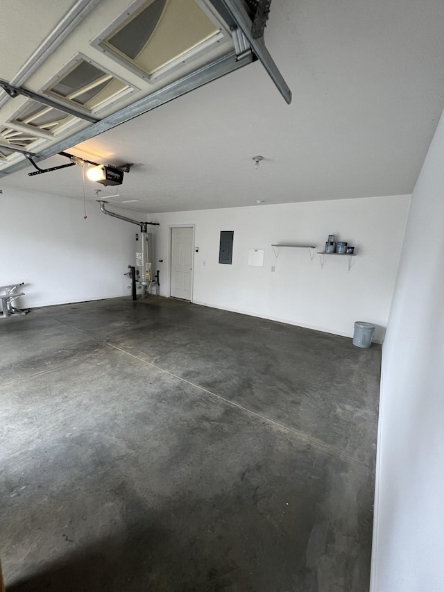 800 Browns Ln Unit L2, Gallatin, TN 37066 - garage featuring water heater, electric panel, and a garage door opener