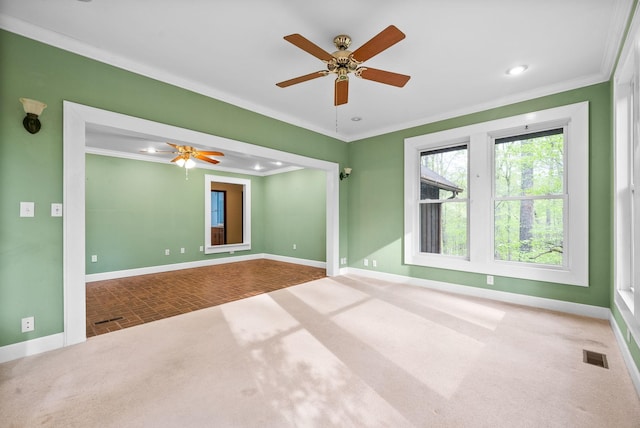 1331 Hutcheson Ln, Clarksville, TN 37040 - empty room featuring crown molding, visible vents, carpet flooring, and baseboards