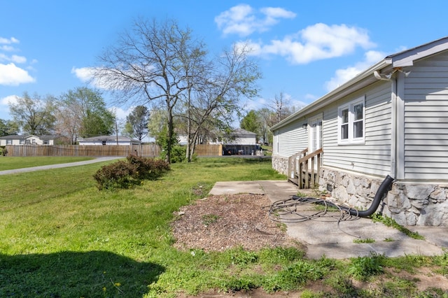 view of yard featuring fence