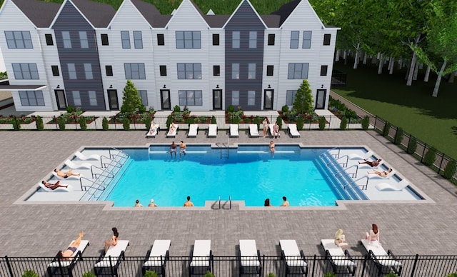 pool featuring a patio area and fence
